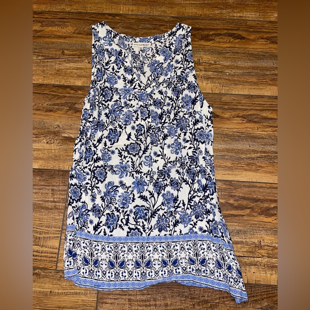 Blue and white floral sleeveless blouse